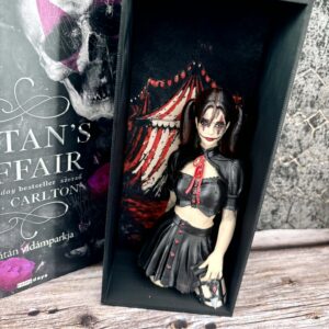 Von „Satan's Affair“ inspirierte Buchstütze